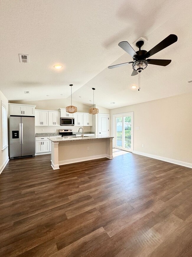 Photo - BEAUTIFUL pond front home! All the details make this a showstopper.! Fenced Yard!!