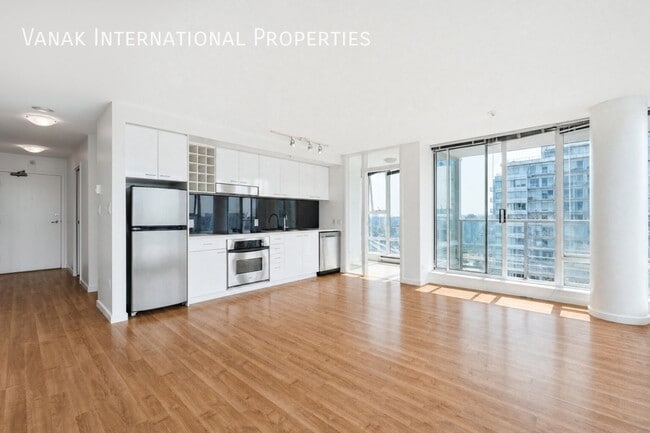 2 Bed + Den + Solarium | 2 Bath | Parking | Spectrum