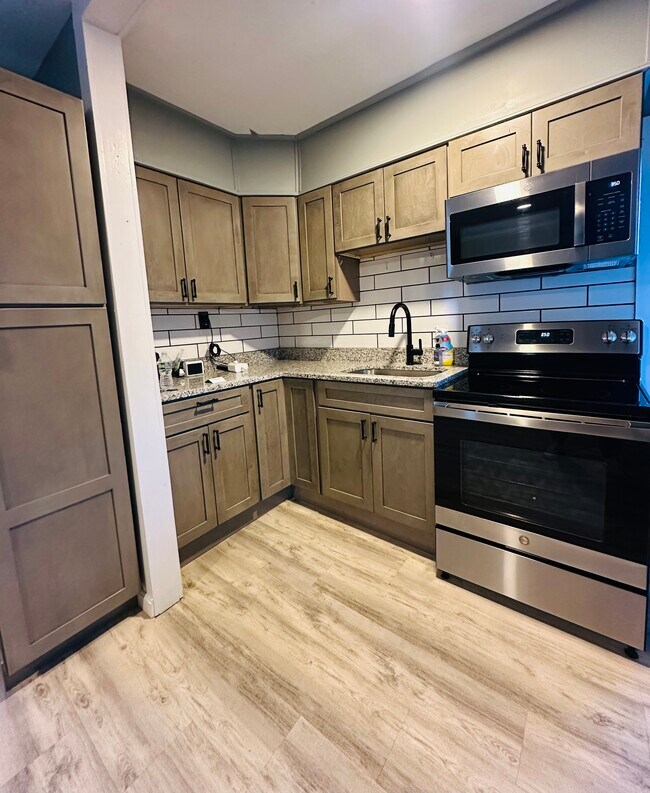 Kitchen With Counter & Cabinets - 69 Winchester St Unit 69 Winchester St