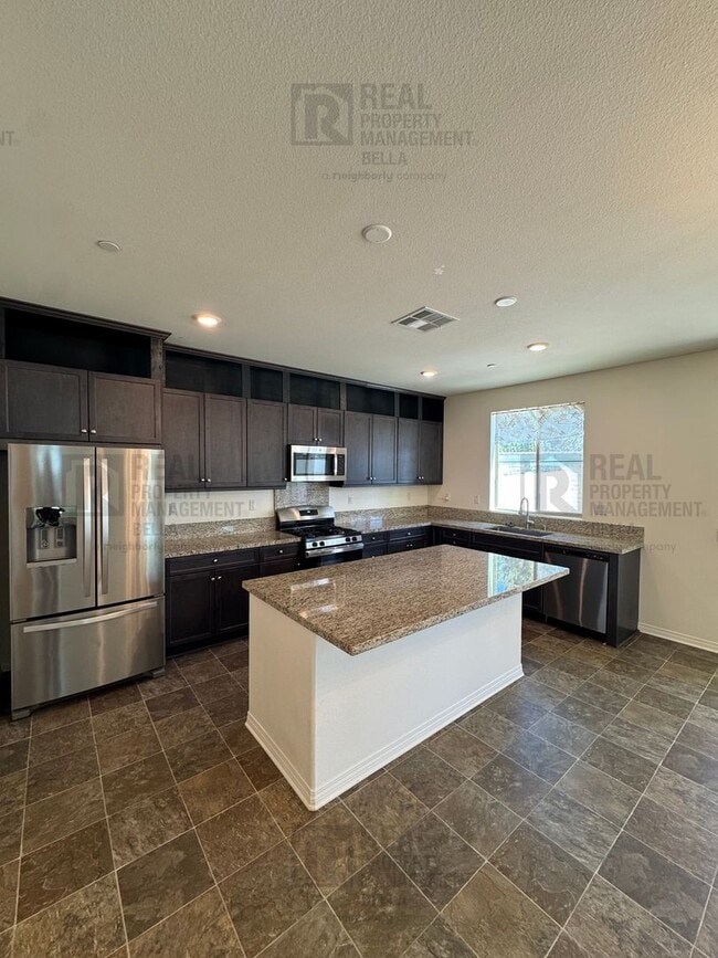 Photo - Spacious Menifee Home with Open Floor Plan, Walk-In Closets & Covered Patio