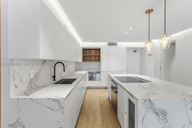 9195 Collins Ave Unit 903