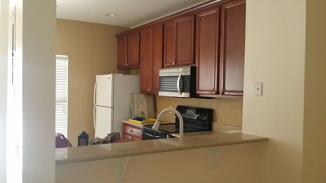 Photo - Stunning 2-Bedroom Townhouse in the Desirable Gated Community of The Hammocks!