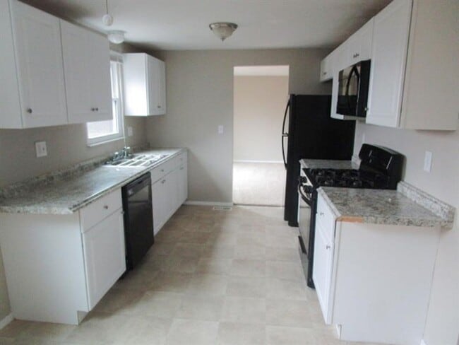 Photo - Spacious 3-Bedroom 1.5 bath Home with Fenced Yard & Garage – Ready for You!