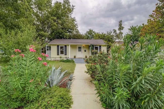 Photo - Discover Your Austin Oasis: Revitalized Bungalow with Hardwood Floors and Entertainer's Deck!