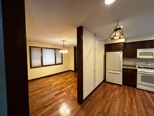 Kitchen opens up to dining room - 14 Conewango Ave Unit 1
