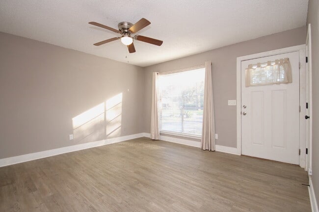 Photo - Beautifully Renovated 3-Bed, 1.5-Bath Home with Screened Porch in Desirable Pace Location