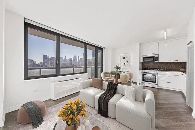 Building Photo - 250 E Houston St Unit 11D