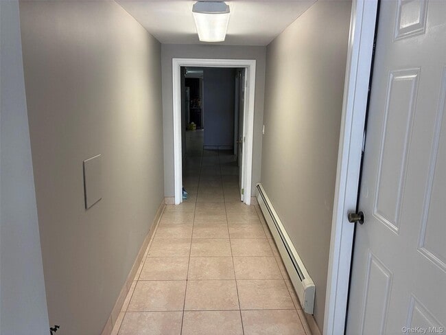 Building Photo - 56-25 136th St Unit 1FL