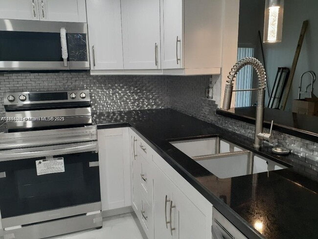 Building Photo - 9421 Fontainebleau Blvd Unit # 212-35 Rental