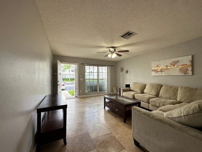 Photo - Beautiful Townhome in a gated community with assigned parking spots and a community pool