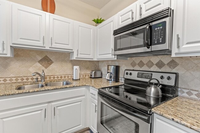 Photo - Beautifully furnished 2B/2B condo steps from Gulf of Mexico available for long term lease!