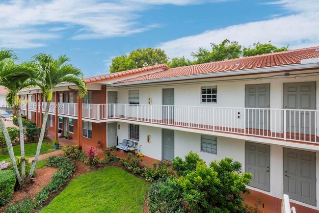 Building Photo - 3100 Coral Springs Dr Unit 2H