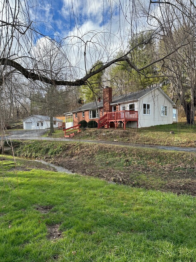 Front, showing house and garage - 295 Carrie Ln House