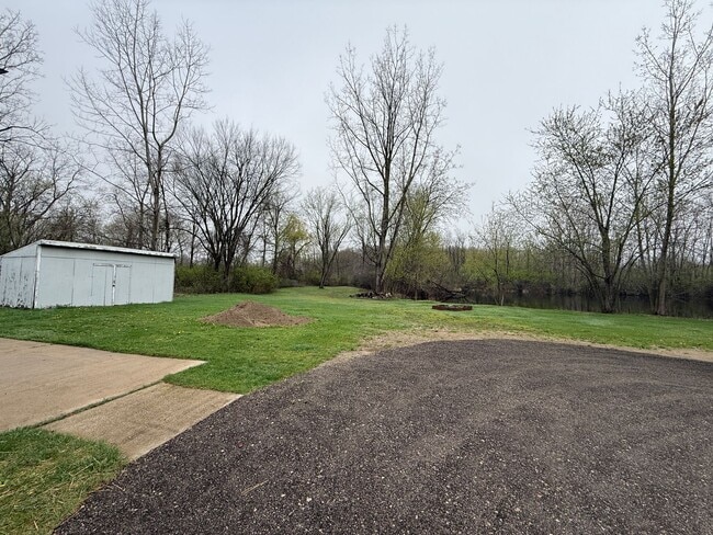 Photo - 3-Bedroom, 2-Bath Home on Acreage with Pond and Large Detached Garage