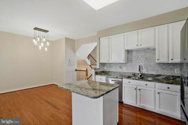 Photo - This beautifully maintained brick-front, three-level townhome is located in a highly sought-after...