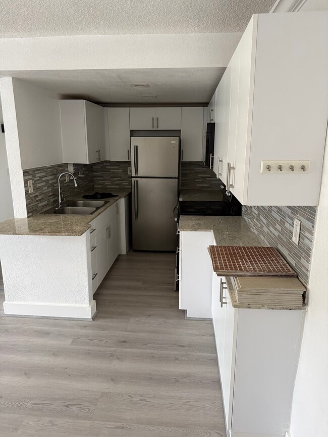 Photo - 606 W 81st St Unit Las Estrellas