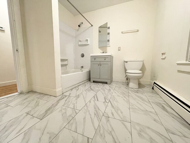 Building Photo - 1570 Tremont St Unit 1t