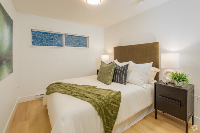 2BR, 2BA - 696SF - Bedroom - Raven Apartments