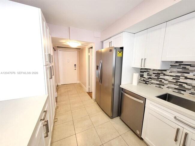 Photo - 501 Three Islands Boulevard Unit 310