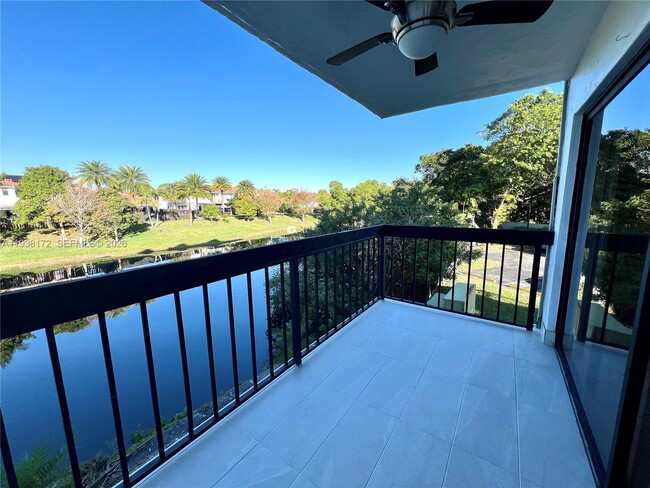 Building Photo - 10315 NW 9th St Cir Unit 207