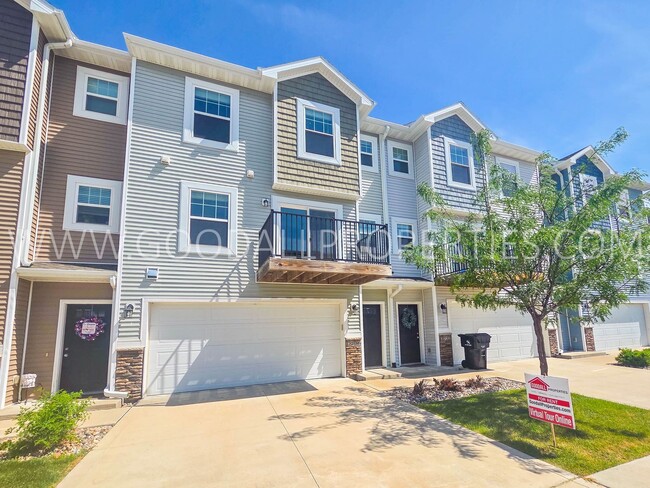 Building Photo - Summer rent special: $250 off the first months rent! Modern Ankeny Townhome with Two Primary Suit...