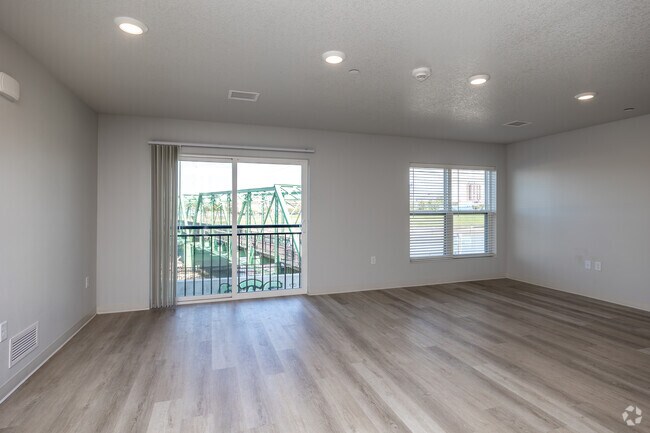 3 habitaciones, 2 baños - 1185 pies cuadrados - Sala de estar - Union at Rivers Edge