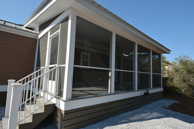 Photo - AVAILABLE 6/10/26 Adorable 2 bedroom cottage available long term off 30A! Huge screened in porch ...