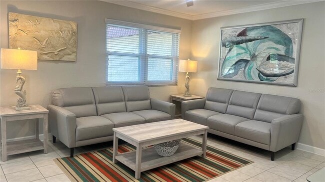 Building Photo - 10036 63rd Ave N Unit 22