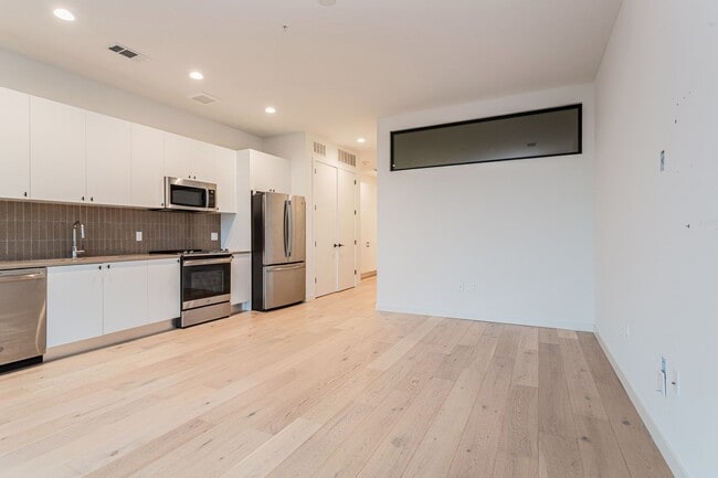 Photo - Light-Filled 2 Bed / 1 Bath – Wide-Plank Hardwood & W/D Included