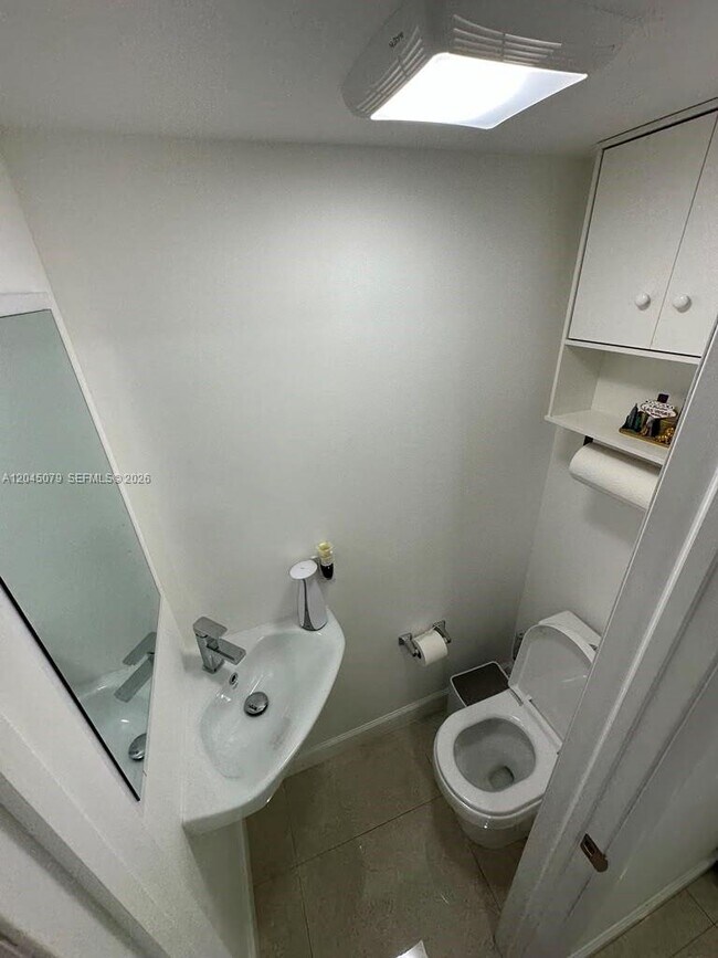 Photo - 1560 W 46th St Unit 228