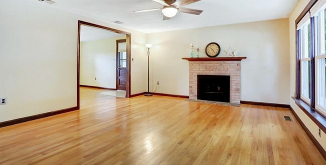 Living Room Dinning Room Fire Place - 407 Mount Allen Drive Casa
