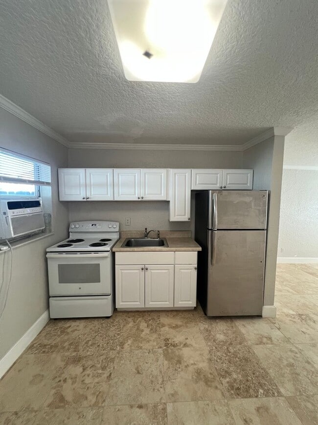Photo - Fantastic Neptune Beach Rental - 1 block from the beach!