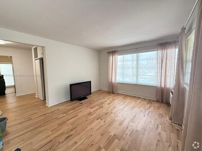 Building Photo - 6944 Byron Ave Unit 9 Rental