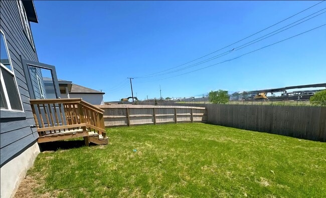 Photo - Like-New 4BR Home w/ Huge Backyard + W/D Included | $500 Move-In Credit