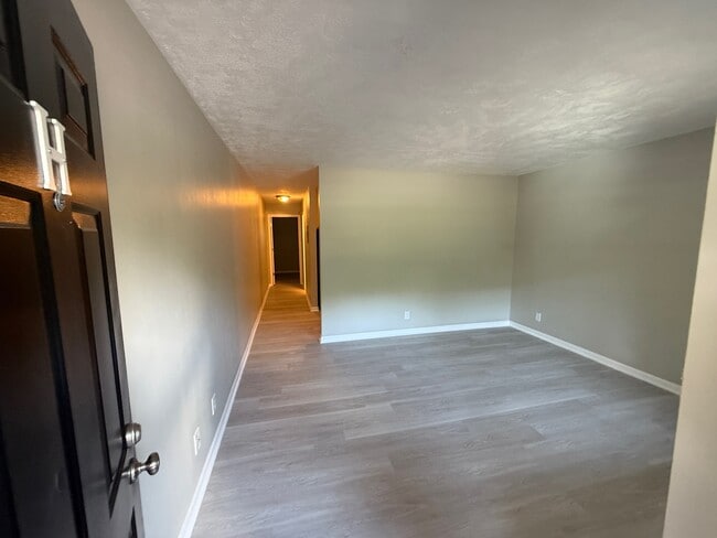 1x1 Living Area - Secret City Apartments