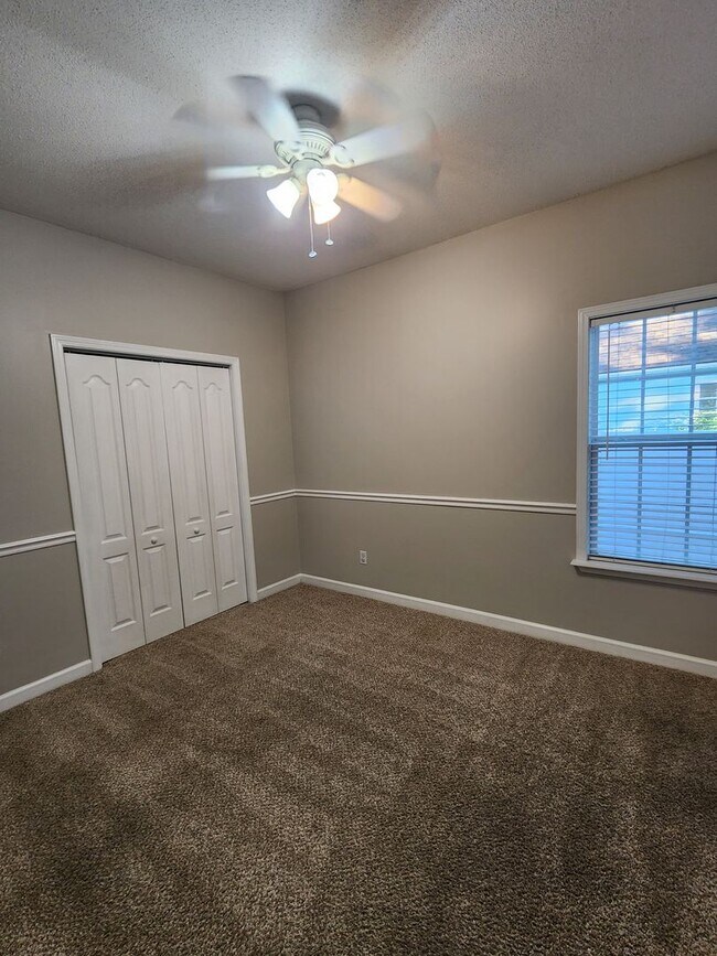 Photo - !!$500!! OFF FIRST MONTH!! Spacious 4BR Home with Fireplace, Screened Porch & Privacy-Fenced Yard