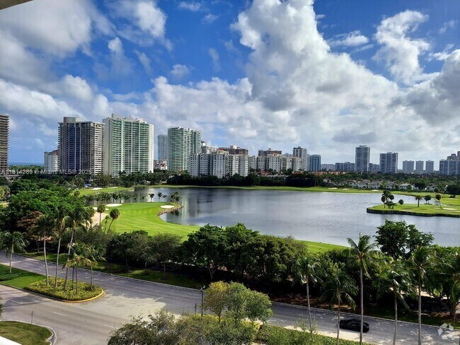 Building Photo - 3625 N Country Club Dr Unit 1004 Rental