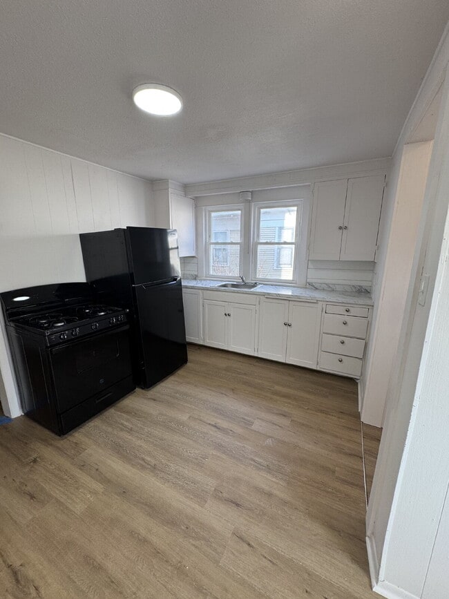 Photo - "Spacious 4-Bed, 3-Bath Home on South Poplar Street – 1758 Sq Ft of Comfort in Wichita!"