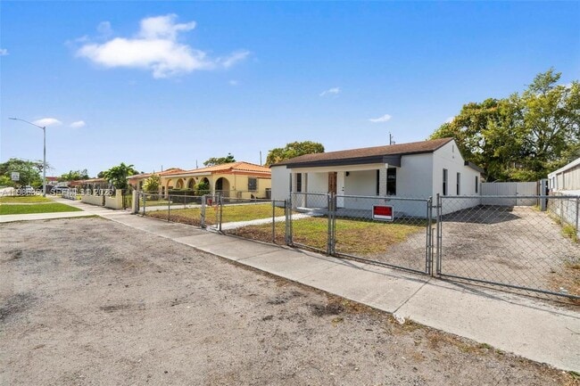 Building Photo - 1060 NW 35th Ave