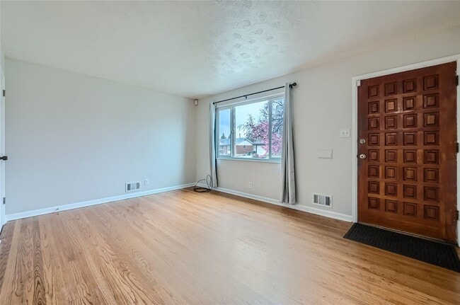 Photo - Great location! Updated 3Bed/2Bath Ranch with full basement, wood floors, and large fenced-in-yard!