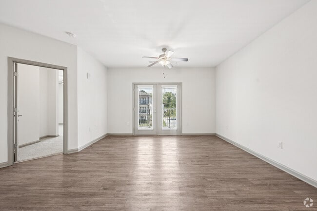 3BR, 2BA - 1,202SF - Living Room - Arbours at Covington