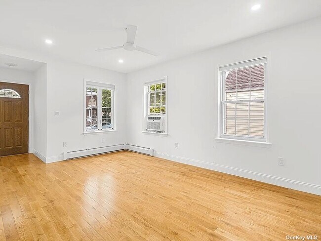 Photo - 65-44-65168 168th St Unit 1+2 FL