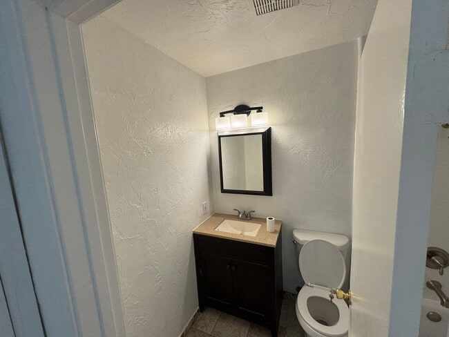 Photo - Two-Story 2 Bedroom, 1 Bath Lakeside Condo with Solar! Unit 2