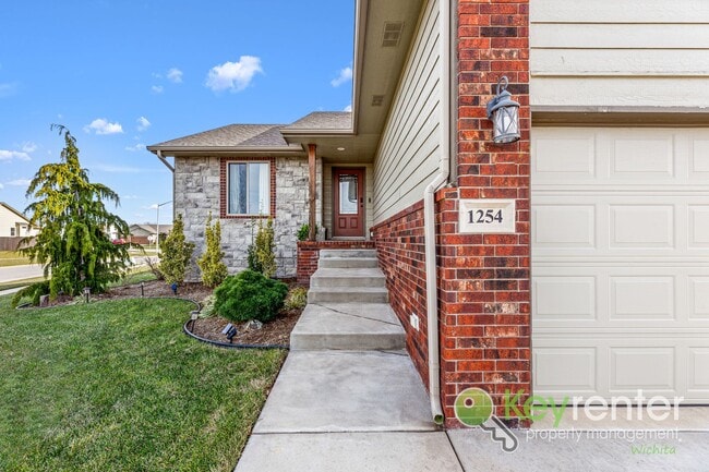 Photo - Spacious 4-Bedroom Home with Finished Basement & 3-Car Garage – Derby, KS