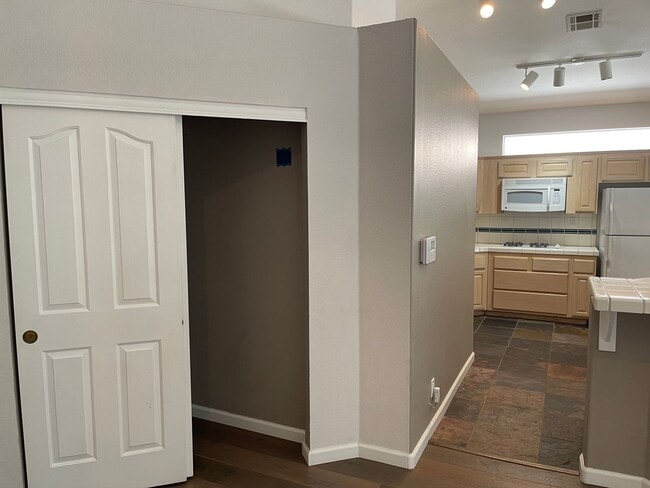 Photo - Charming 3-Bedroom Home Backing to Greenway with Golf Course Access