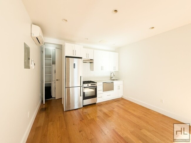 Building Photo - ROGERS AVENUE / 1-Bed 1-Bath Rental