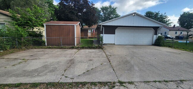 Photo - Beautiful 4 Bedroom, 2 Bathroom Home with garage, shed, deck, and fenced yard!