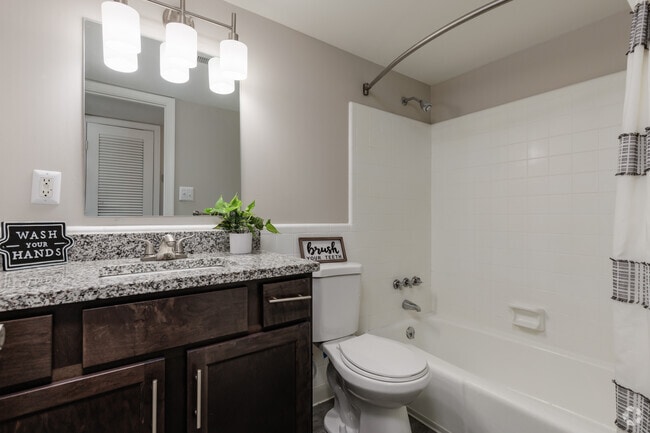 Modern Bathroom with Espresso Cabinetry & Granite Countertops