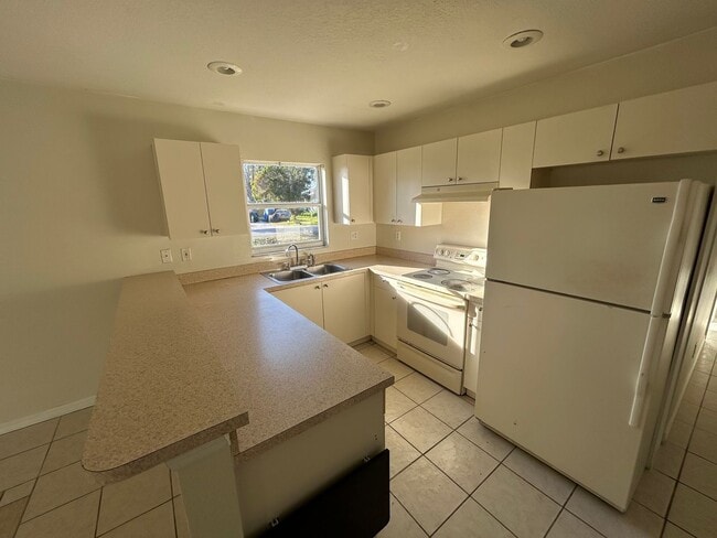 Photo - 4 bedroom, 2 bathroom Sarasota home, plus garage and beautiful lot, conveniently located near Dow...