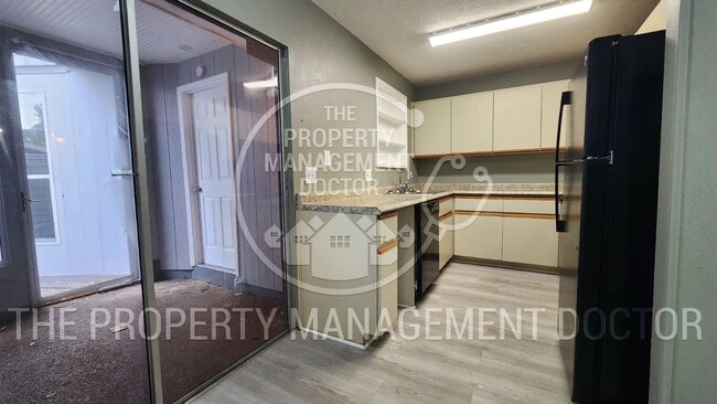 Photo - 4BR/2.5BA Tampa Home | Dual Kitchen Areas, Private Bedroom & Fresh Updates